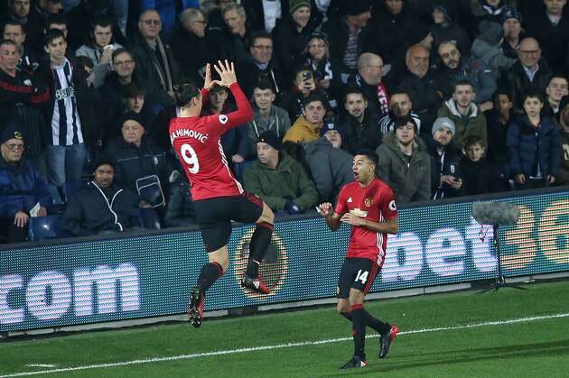 WEST BROMWICH, ENGLAND - DECEMBER 17:  Zlatan Ibrahimovic of Manchester United celebrates scoring the first goal with Jesse Lingard to make the score 0-1 during the Premier League match between West Bromwich Albion and Manchester United at The Hawthorns on December 17, 2016 in West Bromwich, England.  (Photo by Robbie Jay Barratt - AMA/Getty Images)