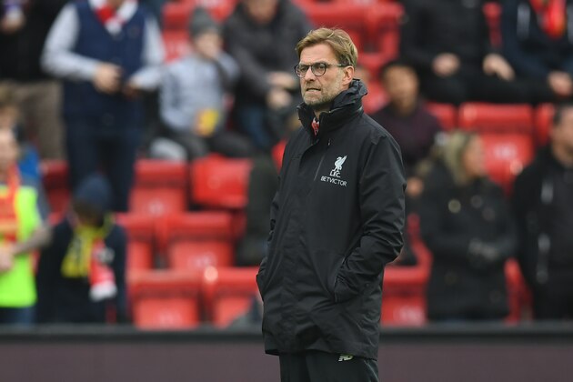 Liverpool's German manager Jurgen Klopp is pictured on the pitch ahead of the English FA Cup third round football match between Liverpool and Plymouth Argyle at Anfield in Liverpool, north west England on January 8, 2017. / AFP / Paul ELLIS / RESTRICTED TO EDITORIAL USE. No use with unauthorized audio, video, data, fixture lists, club/league logos or 'live' services. Online in-match use limited to 75 images, no video emulation. No use in betting, games or single club/league/player publications.  /         (Photo credit should read PAUL ELLIS/AFP/Getty Images)