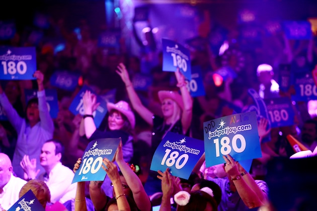 FRIMLEY, ENGLAND - JANUARY 08:  Spectators hold up 180 signs during Day Two of the BDO Lakeside World Professional Darts Championships at the Lakeside Country Club on January 8, 2017 in Frimley, England.  (Photo by Jordan Mansfield/Getty Images)