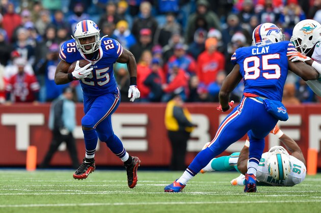 ORCHARD PARK, NY - DECEMBER 24:  LeSean McCoy #25 of the Buffalo Bills runs with the ball against the Miami Dolphins during the first quarter at New Era Field on December 24, 2016 in Orchard Park, New York. The Miami Dolphins defeated the Buffalo Bills 34-31 in overtime. (Photo by Rich Barnes/Getty Images)