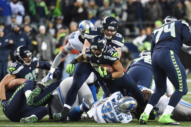 SEATTLE, WA - JANUARY 07:  Thomas Rawls #34 of the Seattle Seahawks carries the ball during the first half against the Detroit Lions in the NFC Wild Card game at CenturyLink Field on January 7, 2017 in Seattle, Washington.  (Photo by Steve Dykes/Getty Images)