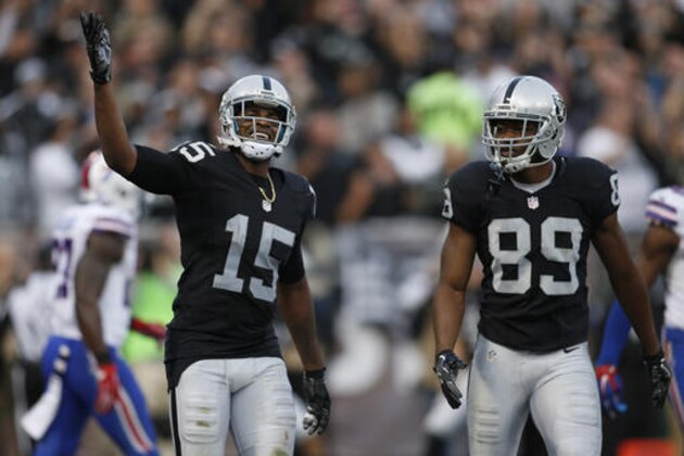 Oakland Raiders wide receiver Michael Crabtree (15) and wide receiver Amari Cooper (89) react during the second half of an NFL football game against the Buffalo Bills in Oakland, Calif., Sunday, Dec. 4, 2016. (AP Photo/D. Ross Cameron) Oakland Raiders wide receiver Michael Crabtree (15) and wide receiver Amari Cooper (89) react during the second half of an NFL football game against the Buffalo Bills in Oakland, Calif., Sunday, Dec. 4, 2016. (AP Photo/D. Ross Cameron)