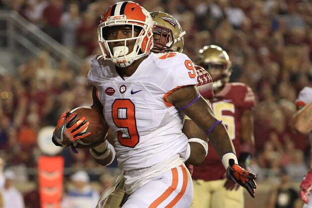 TALLAHASSEE, FL - OCTOBER 29:  Wayne Gallman #9 of the Clemson Tigers celebrates a touchdown during a game against the Florida State Seminoles at Doak Campbell Stadium on October 29, 2016 in Tallahassee, Florida.  (Photo by Mike Ehrmann/Getty Images)