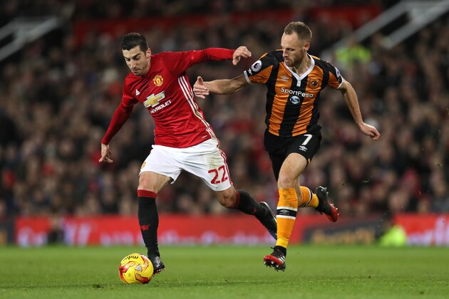 MANCHESTER, ENGLAND - JANUARY 10:  David Meyler of Hull City competes with Henrikh Mkhitaryan of Manchester United during the  EFL Cup Semi-Final first leg match between Manchester United and Hull City at Old Trafford on January 10, 2017 in Manchester, England.  (Photo by Matthew Ashton - AMA/Getty Images)