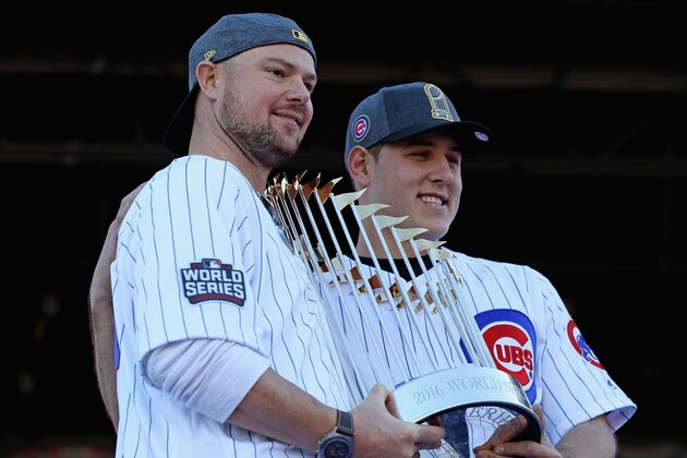 CHICAGO, IL - NOVEMBER 04:  Jon Lester (L) and Anthony Rizzo of the Chicago Cubs pose with the World Series trophy during the Chicago Cubs victory celebration in Grant Park on November 4, 2016 in Chicago, Illinois. The Cubs won their first World Series championship in 108 years after defeating the Cleveland Indians 8-7 in Game 7. (Photo by Jonathan Daniel/Getty Images)