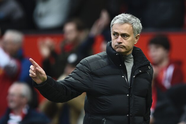 Manchester United's Portuguese manager Jose Mourinho leaves the pitch at the end of the English FA Cup third round football match between Manchester United and Reading at Old Trafford in Manchester, north west England, on January 7, 2017. / AFP / Oli SCARFF / RESTRICTED TO EDITORIAL USE. No use with unauthorized audio, video, data, fixture lists, club/league logos or 'live' services. Online in-match use limited to 75 images, no video emulation. No use in betting, games or single club/league/player publications.  /         (Photo credit should read OLI SCARFF/AFP/Getty Images)