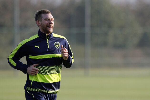 Arsenal's German defender Per Mertesacker runs during a training session at the club's complex in London Colney on December 5, 2016.
Arsenal play FC Basel in a UEFA Champions League Group A match tomorrow. / AFP / ADRIAN DENNIS (Photo credit should read ADRIAN DENNIS/AFP/Getty Images) Arsenal's German defender Per Mertesacker runs during a training session at the club's complex in London Colney on December 5, 2016.
Arsenal play FC Basel in a UEFA Champions League Group A match tomorrow. / AFP / ADRIAN DENNIS (Photo credit should read ADRIAN DENNIS/AFP/Getty Images)