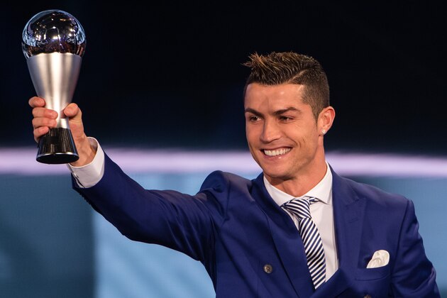 ZURICH, SWITZERLAND - JANUARY 09: Cristiano Ronaldo of Portugal and Real Madrid receives The Best FIFA Men's Player Award during The Best FIFA Football Awards 2016 on January 9, 2017 in Zurich, Switzerland. (Photo by Philipp Schmidli/Getty Images)