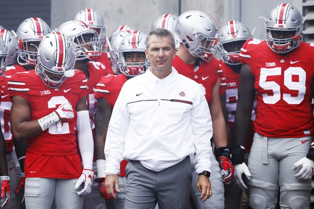 COLUMBUS, OH - OCTOBER 01: Ohio State Buckeyes head coach Urban Meyer prepares to take his team onto the field before the game against the Rutgers Scarlet Knights at Ohio Stadium on October 1, 2016 in Columbus, Ohio. The Buckeyes defeated the Scarlet Knights 58-0. (Photo by Joe Robbins/Getty Images)
