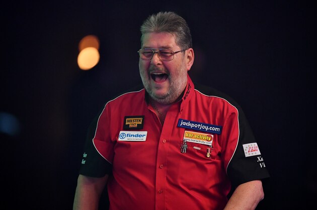 FRIMLEY, ENGLAND - JANUARY 11:  Martin Adams of England makes his way on stage for his Mens' second round match against Jeff Smith of Canada on Day Five of the BDO Lakeside World Professional Darts Championships at the Lakeside Country Club on January 11, 2017 in Frimley, England. (Photo by Dan Mullan/Getty Images)