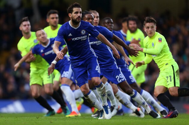LONDON, ENGLAND - JANUARY 08: Cesc Fabregas of Chelsea and others run to defend a free kick during the Emirates FA Cup Third Round between Chelsea and Peterborough United at Stamford Bridge on January 8, 2017 in London, England. (Photo by Catherine Ivill - AMA/Getty Images)