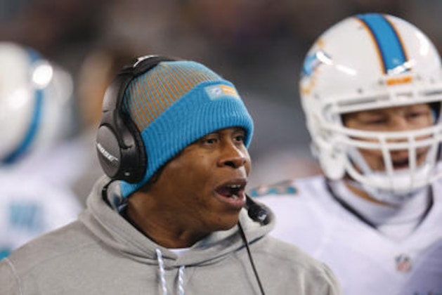 Miami Dolphins defensive coordinator Vance Joseph talks to players during a timeout during the second quarter of an NFL football game against the New York Jets, Saturday, Dec. 17, 2016, in East Rutherford, N.J. (AP Photo/Adam Hunger)