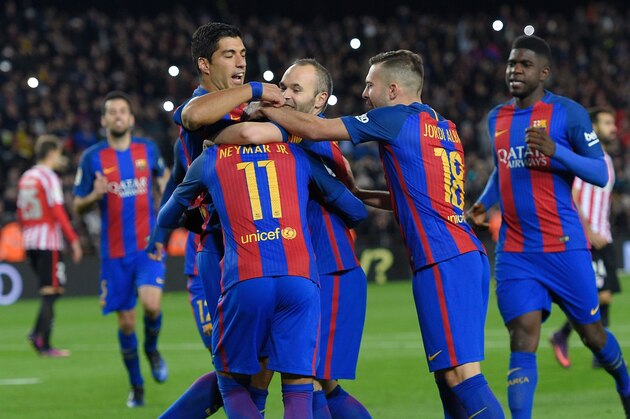 Barcelona's players celebrate after scoring a goal during the Spanish Copa del Rey (King's Cup) round of 16 second leg football match FC Barcelona vs Athletic Club de Bilbao at the Camp Nou stadium in Barcelona on January 11, 2017. / AFP / LLUIS GENE        (Photo credit should read LLUIS GENE/AFP/Getty Images)