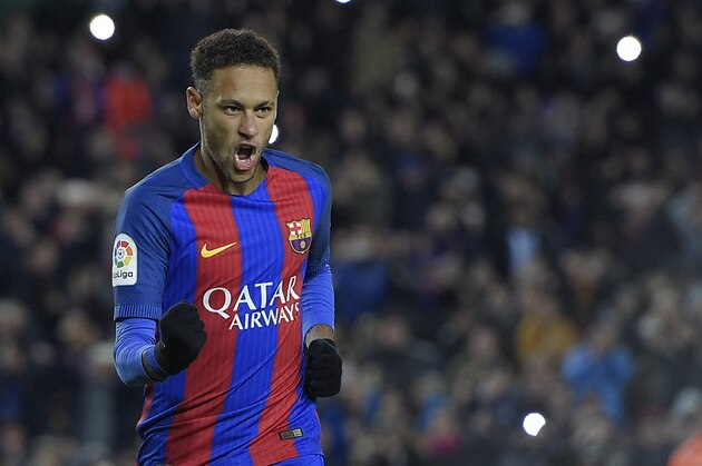 Barcelona's Brazilian forward Neymar celebrates after scoring a goal during the Spanish Copa del Rey (King's Cup) round of 16 second leg football match FC Barcelona vs Athletic Club de Bilbao at the Camp Nou stadium in Barcelona on January 11, 2017. / AFP / LLUIS GENE        (Photo credit should read LLUIS GENE/AFP/Getty Images)