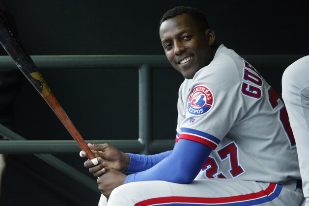SAN FRANCISCO - MAY 14:  Vladimir Guerrero #27 of the Montreal Expos laughs in the dugout during the game against the San Francisco Giants at Pac Bell Park on May 14, 2003 in San Francisco, California.  The Expos defeated the Giants 6-3.  (Photo by Jed Jacobsohn/Getty Images)