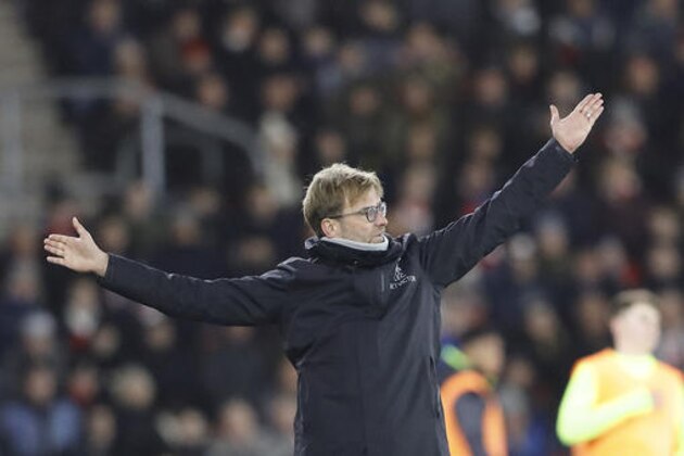 Liverpool's head coach Juergen Klopp gestures during the English League Cup semifinal first leg soccer match between Southampton and Liverpool at St. Mary's stadium in Southampton, England, Wednesday, Jan. 11, 2017.(AP Photo/Frank Augstein)