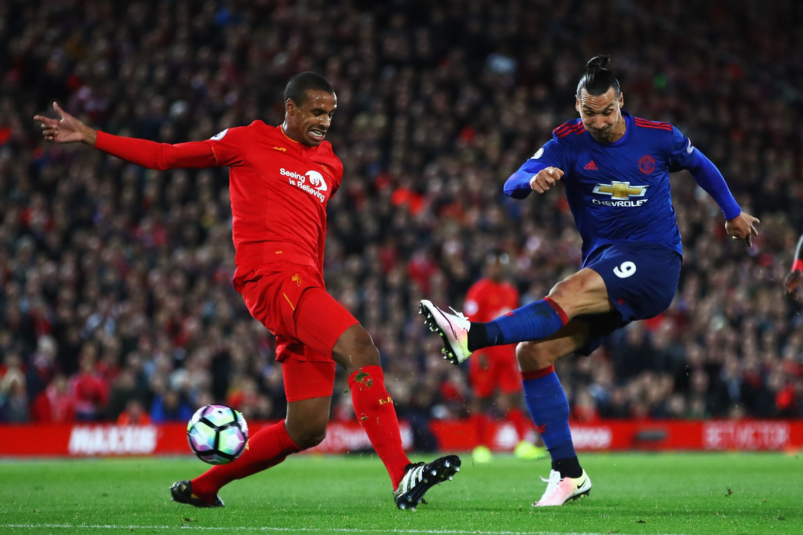 LIVERPOOL, ENGLAND - OCTOBER 17:  Joel Matip of Liverpool closes down Zlatan Ibrahimovic of Manchester United as he shoots during the Premier League match between Liverpool and Manchester United at Anfield on October 17, 2016 in Liverpool, England.  (Photo by Clive Brunskill/Getty Images)
