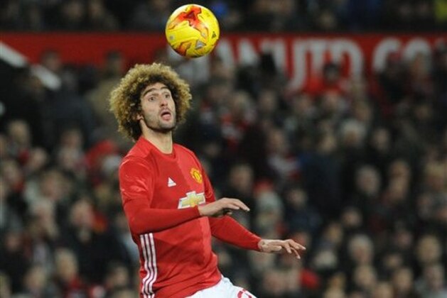 Manchester United’s Marouane Fellaini during the English League Cup, semifinal, 1st leg, match between Manchester United and Hull City at Old Trafford in Manchester, England, Tuesday Jan. 10, 2017. (AP Photo/Rui Vieira)