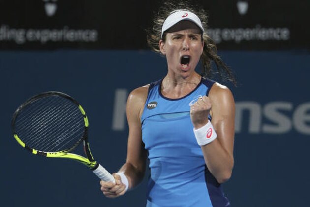 Britain's Johanna Konta celebrates her win over Eugenie Bouchard of Canada during their women's semifinal singles match at the Sydney International tennis tournament in Sydney, Australia, Thursday, Jan. 12, 2017. (AP Photo/Rick Rycroft)