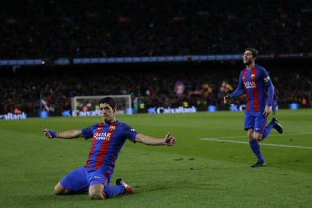 FC Barcelona's Luis Suarez celebrates after scoring during a Copa del Rey, 16 round, second leg, between FC Barcelona and Athletic Bilbao at the Camp Nou in Barcelona, Spain, Wednesday, Jan. 11, 2017. (AP Photo/Manu Fernandez)