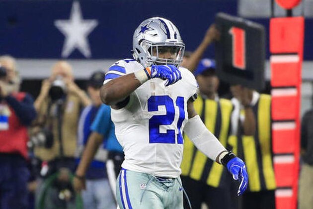 Dallas Cowboys running back Ezekiel Elliott gestures after running for a first down against the Tampa Bay Buccaneers in the second half of an NFL football game, Sunday, Dec. 18, 2016, in Arlington, Texas. (AP Photo/Ron Jenkins)