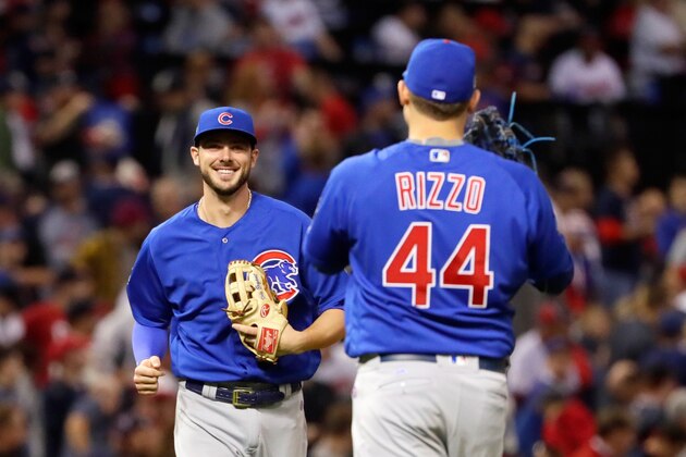 CLEVELAND, OH - NOVEMBER 01:  Kris Bryant #17 of the Chicago Cubs reacts with Anthony Rizzo #44 after defeating the Cleveland Indians 9-3 to win Game Six of the 2016 World Series at Progressive Field on November 1, 2016 in Cleveland, Ohio.  (Photo by Jamie Squire/Getty Images)