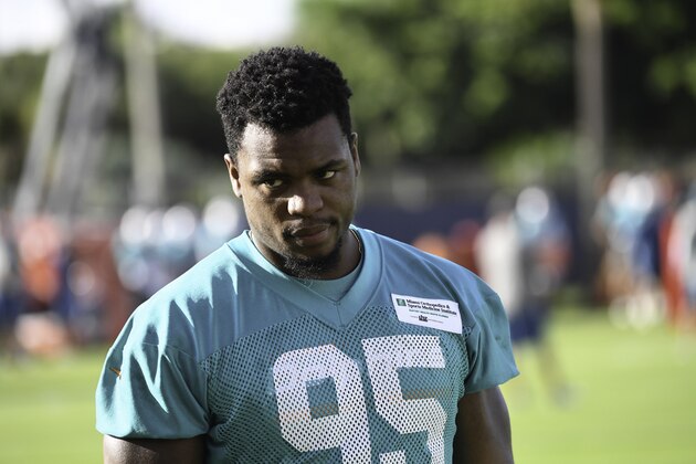 DAVIE, FL - JULY 31:  Dion Jordan #95 of the Miami Dolphins looks on during training camp on July 31, 2016 at the Miami Dolphins training facility in Davie, Florida. (Photo by Ron Elkman/Sports Imagery/Getty Images)