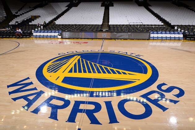 OAKLAND, CA - DECEMBER 28: A shot of the Golden State Warriors logo before a game against the Toronto Raptors on December 28, 2016 at ORACLE Arena in Oakland, California. NOTE TO USER: User expressly acknowledges and agrees that, by downloading and/or using this photograph, user is consenting to the terms and conditions of Getty Images License Agreement. Mandatory Copyright Notice: Copyright 2016 NBAE (Photo by Noah Graham/NBAE via Getty Images) OAKLAND, CA - DECEMBER 28: A shot of the Golden State Warriors logo before a game against the Toronto Raptors on December 28, 2016 at ORACLE Arena in Oakland, California. NOTE TO USER: User expressly acknowledges and agrees that, by downloading and/or using this photograph, user is consenting to the terms and conditions of Getty Images License Agreement. Mandatory Copyright Notice: Copyright 2016 NBAE (Photo by Noah Graham/NBAE via Getty Images)