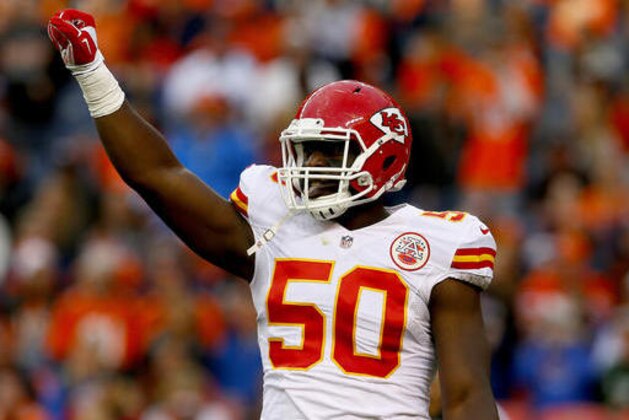 FILE - In this Nov. 15, 2015, file photo, Kansas City Chiefs outside linebacker Justin Houston (50) celebrates a stop during the second half of an NFL football game against the Denver Broncos in Denver. Houston has been cleared to resume football activity for the first time since having surgery to repair the ACL in his left knee in February. Chiefs trainer Rick Burkholder said Wednesday, Oct. 12, 2016, that Houston visited Dr. James Andrews on Oct. 3, the day after a loss in Pittsburgh, and was given clearance to do football-related workouts.  (AP Photo/Joe Mahoney, File)