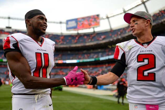 DENVER, CO - OCTOBER 9:  Quarterback Matt Ryan #2 and wide receiver Julio Jones #11 of the Atlanta Falcons walk off the field after a game against the Denver Broncos at Sports Authority Field at Mile High on October 9, 2016 in Denver, Colorado. (Photo by Dustin Bradford/Getty Images)