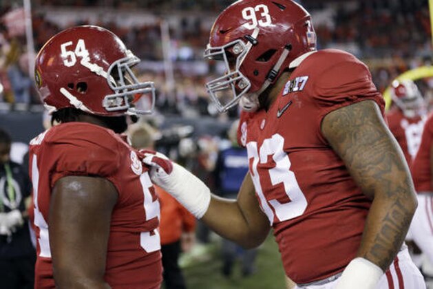 Alabama's Jonathan Allen talks to Dalvin Tomlinson (54) before the NCAA college football playoff championship game against Clemson Monday, Jan. 9, 2017, in Tampa, Fla. (AP Photo/David J. Phillip) Alabama's Jonathan Allen talks to Dalvin Tomlinson (54) before the NCAA college football playoff championship game against Clemson Monday, Jan. 9, 2017, in Tampa, Fla. (AP Photo/David J. Phillip)