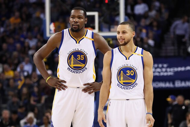 OAKLAND, CA - JANUARY 12: Stephen Curry #30 of the Golden State Warriors talks to Kevin Durant #35 during their game against the Detroit Pistons at ORACLE Arena on January 12, 2017 in Oakland, California. NOTE TO USER: User expressly acknowledges and agrees that, by downloading and or using this photograph, User is consenting to the terms and conditions of the Getty Images License Agreement. (Photo by Ezra Shaw/Getty Images) OAKLAND, CA - JANUARY 12: Stephen Curry #30 of the Golden State Warriors talks to Kevin Durant #35 during their game against the Detroit Pistons at ORACLE Arena on January 12, 2017 in Oakland, California. NOTE TO USER: User expressly acknowledges and agrees that, by downloading and or using this photograph, User is consenting to the terms and conditions of the Getty Images License Agreement. (Photo by Ezra Shaw/Getty Images)