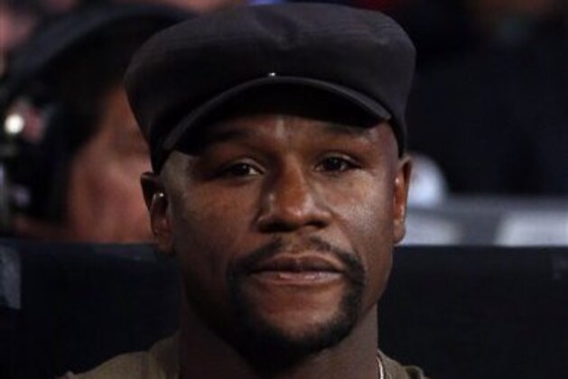 Floyd Mayweather attends a fight between Jessie Vargas and Manny Pacquiao Saturday, Nov. 5, 2016, in Las Vegas. (AP Photo/Isaac Brekken) Floyd Mayweather attends a fight between Jessie Vargas and Manny Pacquiao Saturday, Nov. 5, 2016, in Las Vegas. (AP Photo/Isaac Brekken)