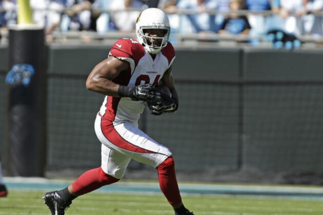 Arizona Cardinals' Jermaine Gresham (84) runs after a catch against the Carolina Panthers in the first quarter of an NFL football game in Charlotte, N.C., Sunday, Oct. 30, 2016. (AP Photo/Bob Leverone)