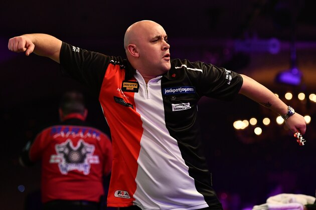 FRIMLEY, ENGLAND - JANUARY 13:  Jamie Hughes of England celebrates victory during his Mens Quarter Final match against Martin Adams of England on day seven of the BDO Lakeside World Professional Darts Championships at the Lakeside Country Club on January 13, 2017 in Frimley, England. (Photo by Dan Mullan/Getty Images)