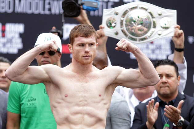 Mexican Saul 'Canelo' Alvarez poses during the weigh-in on May 6, 2016 in Las Vegas. 
Alvarez will fight for the WBC Middleweight title on May 7, 2016, against British Amir Khan at the T-Mobile Arena in Las Vegas.   / AFP / John Gurzinski        (Photo credit should read JOHN GURZINSKI/AFP/Getty Images)