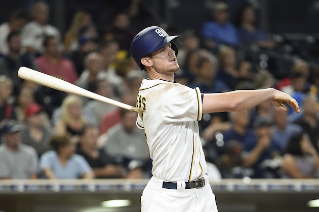 SAN DIEGO, CALIFORNIA - SEPTEMBER 19:  Wil Myers #4 of the San Diego Padres hits a solo home run during the fourth inning of a baseball game against the Arizona Diamondbacks at PETCO Park on September 19, 2016 in San Diego, California.  (Photo by Denis Poroy/Getty Images)