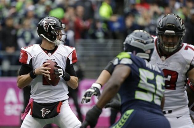 Atlanta Falcons quarterback Matt Ryan looks to pass against the Seattle Seahawks in the first half of an NFL football game, Sunday, Oct. 16, 2016, in Seattle. (AP Photo/Elaine Thompson)