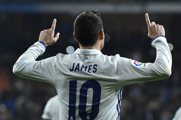 TOPSHOT - Real Madrid's Colombian midfielder James Rodriguez celebrates after scoring on a penalty kick during the Spanish Copa del Rey (King's Cup) round of 16 first leg football match Real Madrid CF vs Sevilla FC at the Santiago Bernabeu stadium in Madrid on January 4, 2017. / AFP / GERARD JULIEN        (Photo credit should read GERARD JULIEN/AFP/Getty Images)