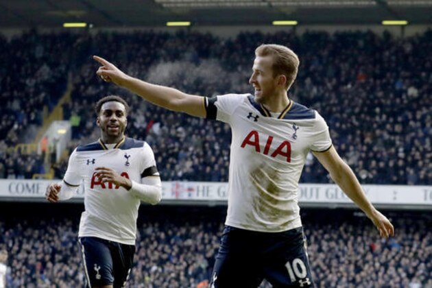 Tottenham Hotspur's Harry Kane, right, celebrates scoring his side's third goal during the English Premier League soccer match between Tottenham Hotspur and West Bromwich Albion at White Hart Lane stadium in London, Saturday, Jan. 14, 2017. (AP Photo/Matt Dunham)
