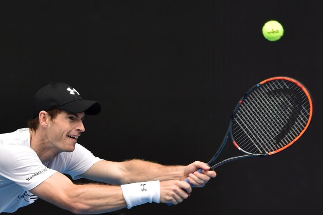 Andy Murray of Britain hits a return during a practice session ahead of the Australian Open tennis tournament in Melbourne on January 14, 2017.  / AFP / PAUL CROCK / --IMAGE RESTRICTED TO EDITORIAL USE - STRICTLY NO COMMERCIAL USE--        (Photo credit should read PAUL CROCK/AFP/Getty Images)