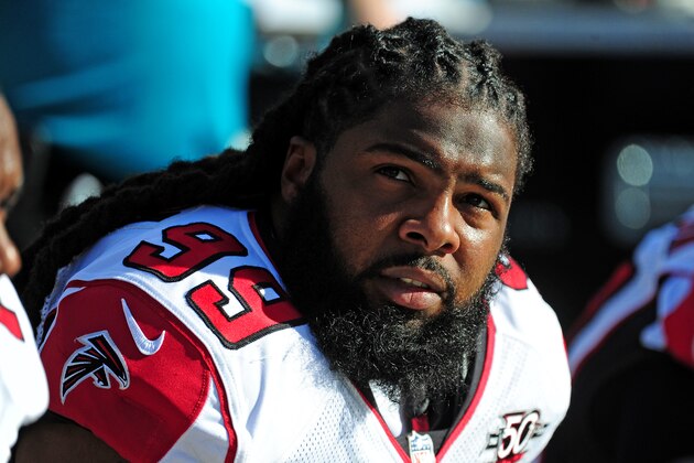 CHARLOTTE, NC - DECEMBER 13: Adrian Clayborn #99 of the Atlanta Falcons watches the action against the Carolina Panthers at Bank Of America Stadium on December 13, 2015 in Charlotte, North Carolina. (Photo by Scott Cunningham/Getty Images)