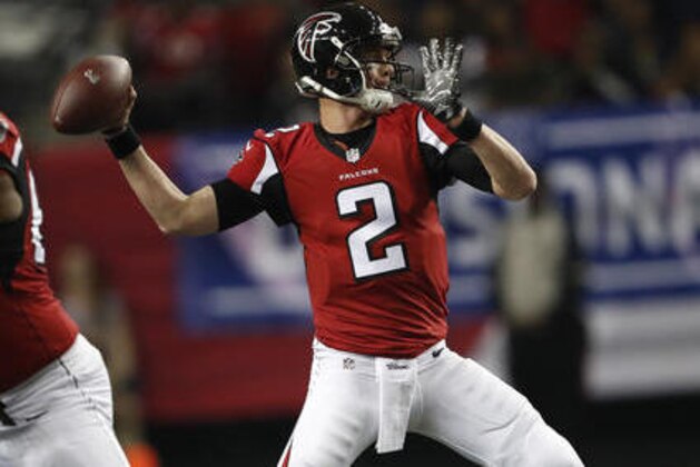 Atlanta Falcons quarterback Matt Ryan (2) works against the Seattle Seahawks during the first half of an NFL football NFC divisional playoff game, Saturday, Jan. 14, 2017, in Atlanta. (AP Photo/John Bazemore)