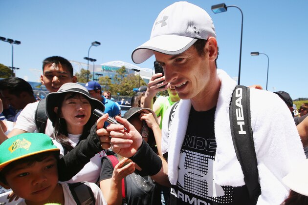 MELBOURNE, AUSTRALIA - JANUARY 12:  Andy Murray of Great Britain is mobbed by fans after a practice session ahead of the 2017 Australian Open at Melbourne Park on January 12, 2017 in Melbourne, Australia.  (Photo by Michael Dodge/Getty Images)