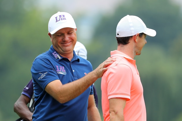 JOHANNESBURG, SOUTH AFRICA - JANUARY 15:  Graeme Storm of England and Rory McIlroy of Northern Ireland share a joke during day four of the BMW South African Open Championship at Glendower Golf Club on January 15, 2017 in Johannesburg, South Africa.  (Photo by Warren Little/Getty Images)
