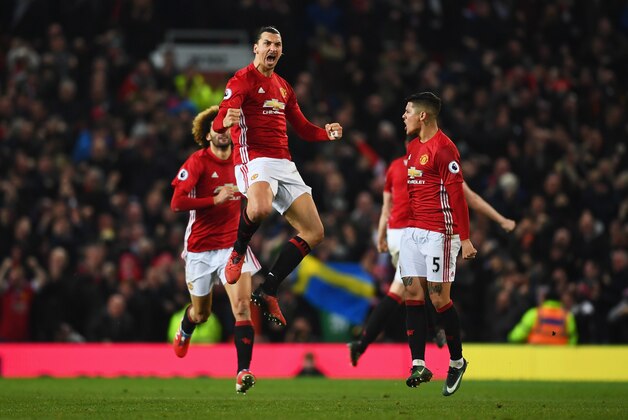 MANCHESTER, ENGLAND - JANUARY 15:  Zlatan Ibrahimovic of Manchester United (C) celebrates as he scores their first and equalising goal during the Premier League match between Manchester United and Liverpool at Old Trafford on January 15, 2017 in Manchester, England.  (Photo by Laurence Griffiths/Getty Images)