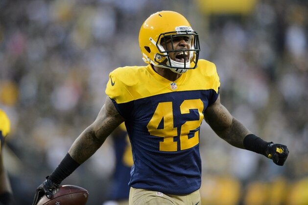 GREEN BAY, WI - OCTOBER 16: Morgan Burnett #42 of the Green Bay Packers celebrates catching an interception against the Dallas Cowboys during the game on October 16, 2016 at Lambeau Field in Green Bay, Wisconsin. The Cowboys defeated the Packers 30-16. (Photo by Hannah Foslien/Getty Images)