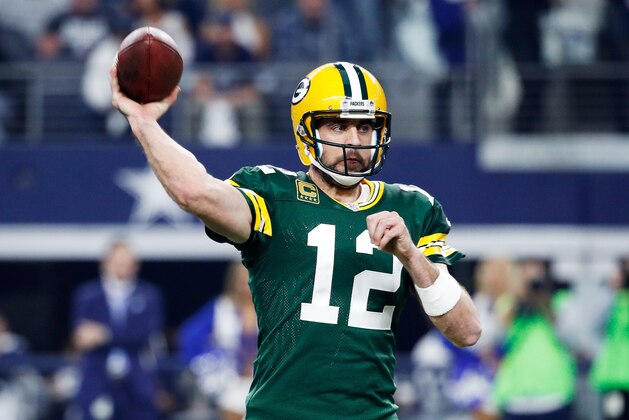 ARLINGTON, TX - JANUARY 15:  Aaron Rodgers #12 of the Green Bay Packers throws a pass in the first half during the NFC Divisional Playoff Game against the Dallas Cowboys at AT&T Stadium on January 15, 2017 in Arlington, Texas.  (Photo by Joe Robbins/Getty Images)