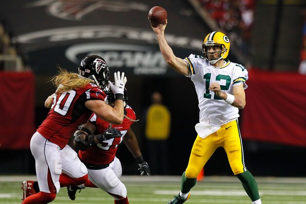 ATLANTA, GA - OCTOBER 30:  Aaron Rodgers #12 of the Green Bay Packers looks to pass against Brooks Reed #50 of the Atlanta Falcons at Georgia Dome on October 30, 2016 in Atlanta, Georgia.  (Photo by Kevin C. Cox/Getty Images)