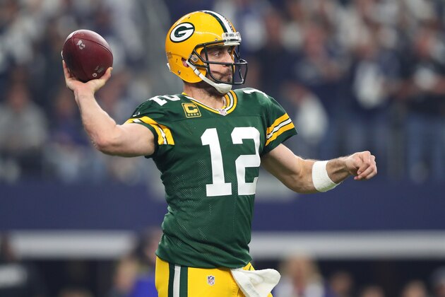 ARLINGTON, TX - JANUARY 15:  Aaron Rodgers #12 of the Green Bay Packers drops back to pass during the first quarter against the Dallas Cowboys in the NFC Divisional Playoff game at AT&T Stadium on January 15, 2017 in Arlington, Texas.  (Photo by Tom Pennington/Getty Images)
